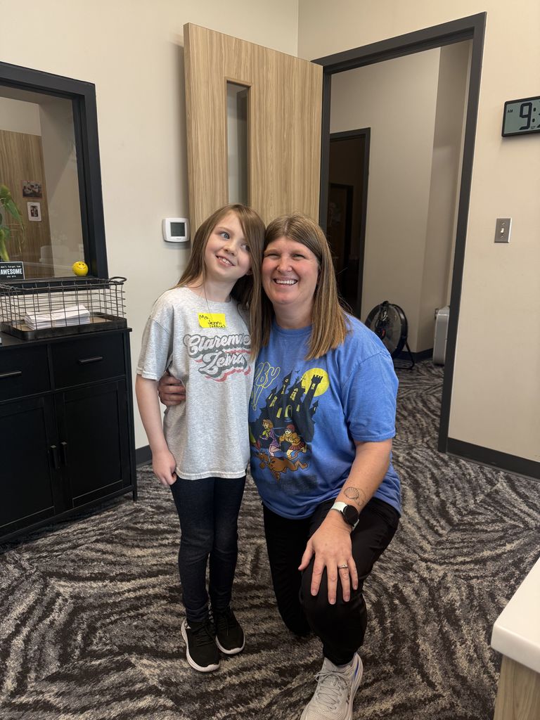 staff and student dressed as student and staff