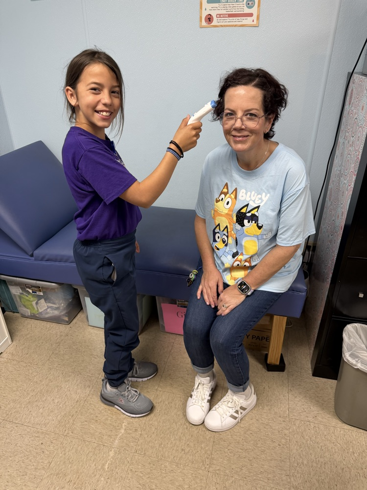 teacher and student dressed like eachother