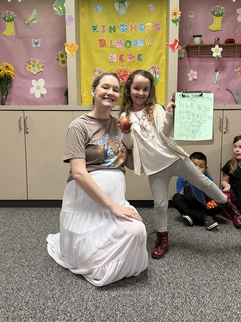 student dressed as teacher with teacher