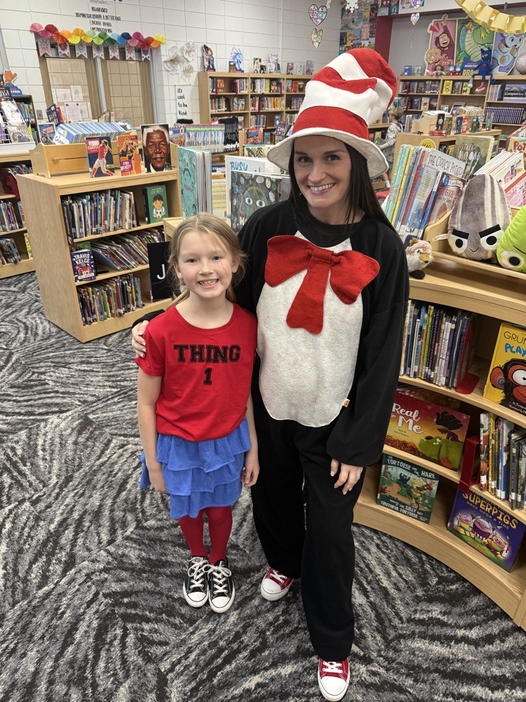 ms lang dressed as Dr Seuss with student 