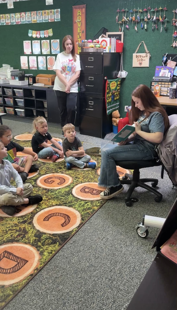 students being read to