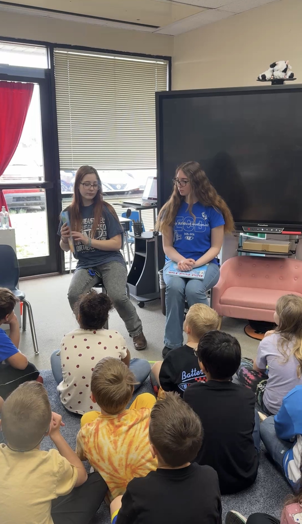 students from NE tech reading to students