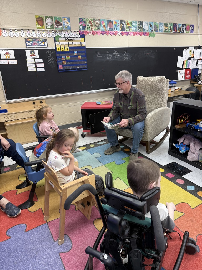 students being read to