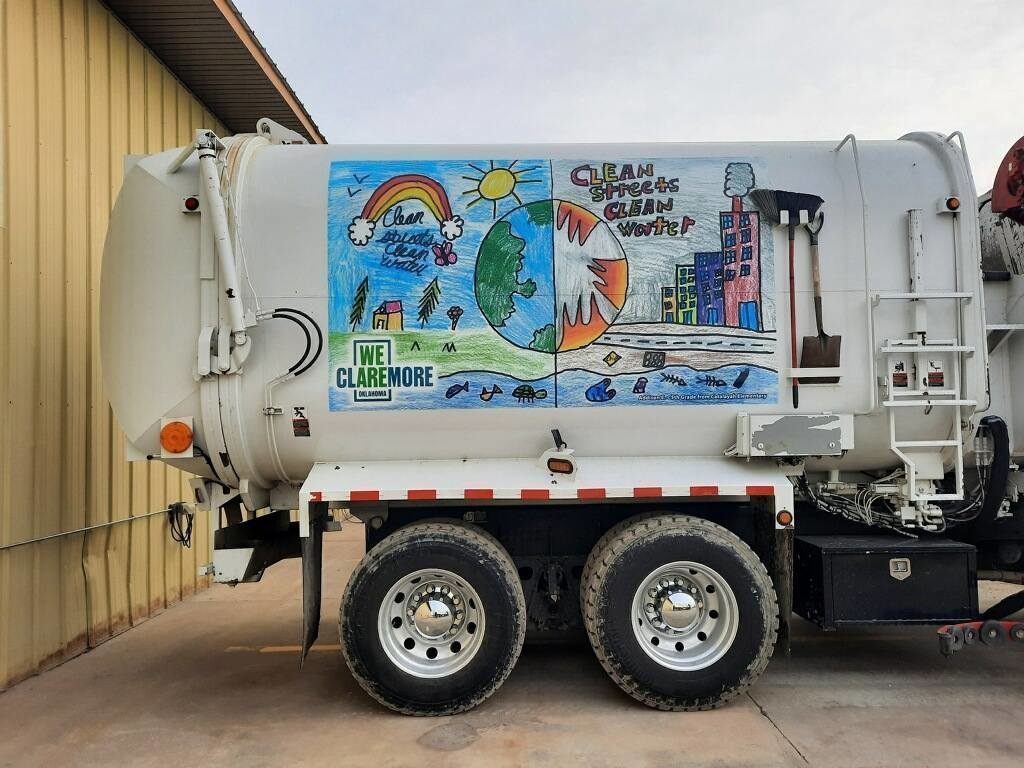 trash truck with Addi's artwork on it.
