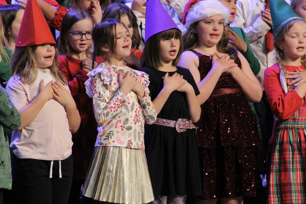 Students singing in the Roosa Family Christmas program