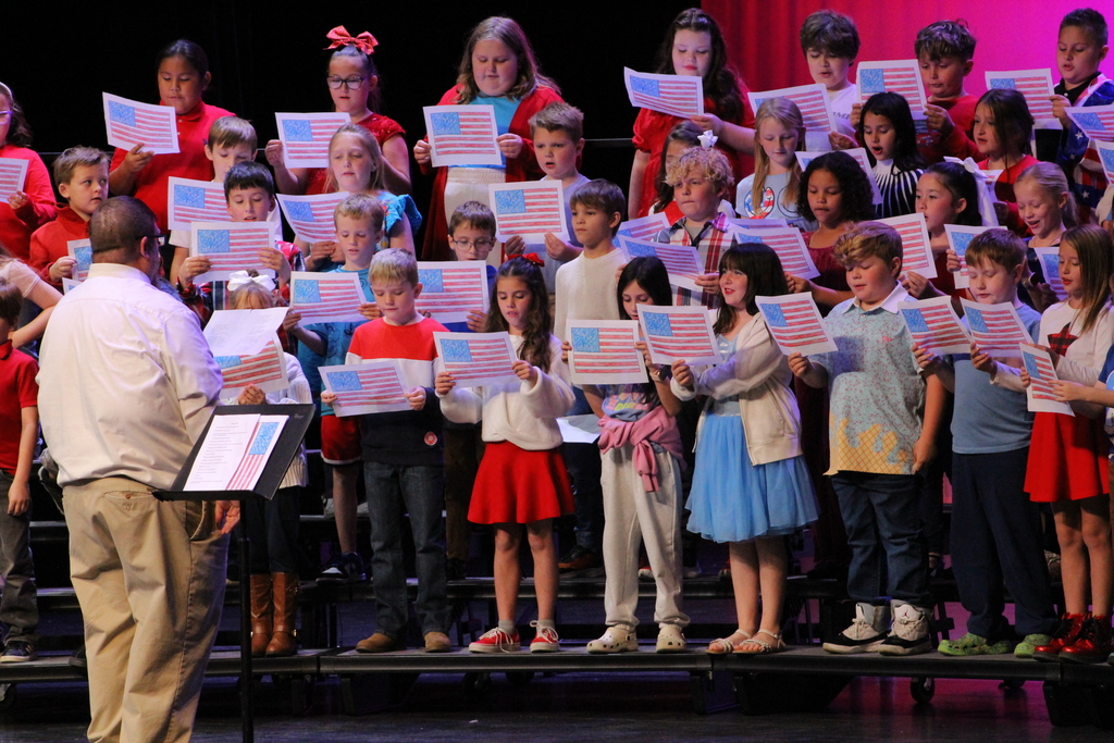 Westside students on stage at the RPAC for their Veterans Day Program