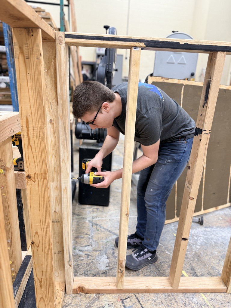 Student working on a set piece