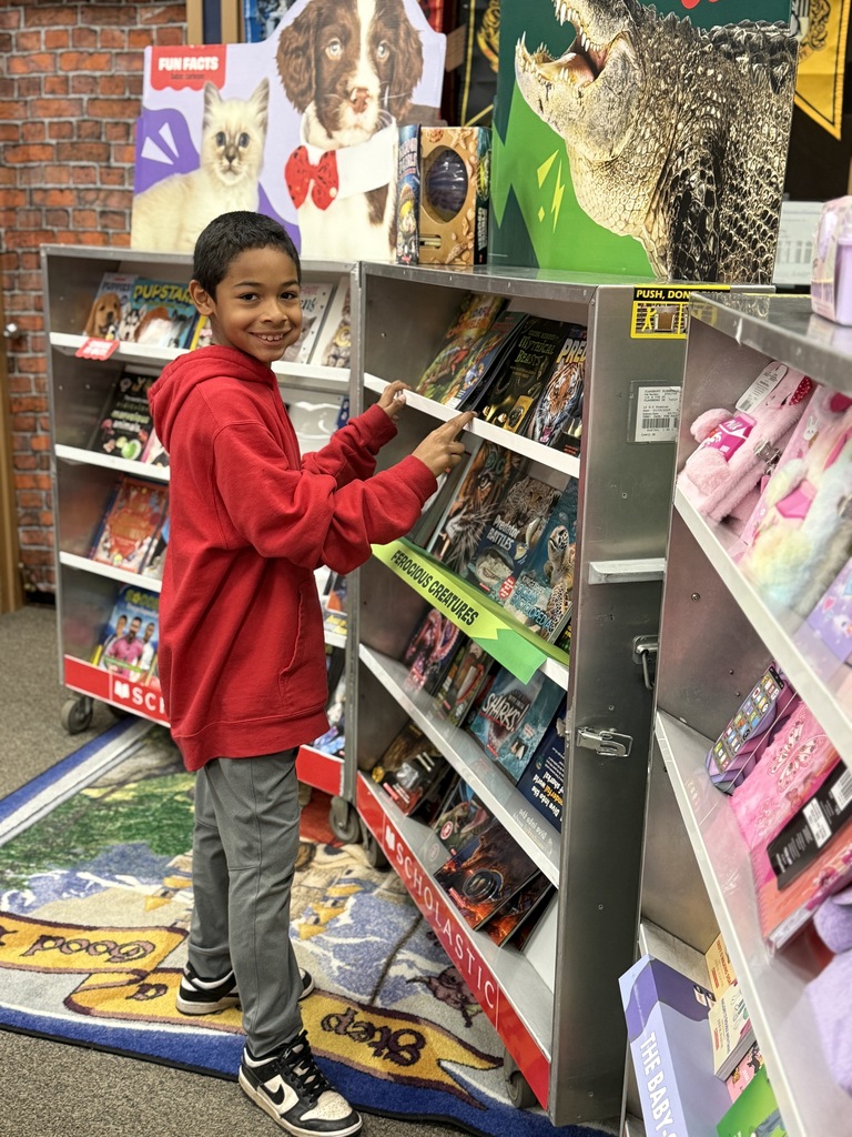 Student at book fair looking around