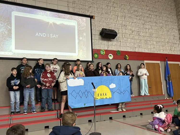 students presenting song 