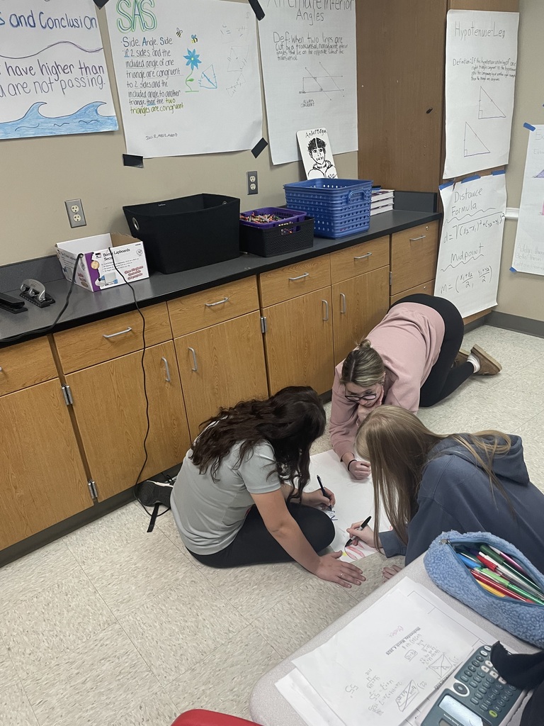 Students in Coach Crenshaw’s Honor Geometry classes have been hard at work creating anchor charts to help reinforce key geometry concepts. These charts allow students to break down important formulas, vocabulary, and problem-solving strategies in a visual and collaborative way.  By working together to design their charts, students are not only strengthening their understanding of the material but also creating helpful resources they can reference throughout the unit. Activities like this encourage critical thinking, teamwork, and deeper engagement with the content.  Great work to Coach Crenshaw’s classes for turning geometry concepts into creative and meaningful learning tools!