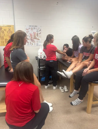 We want to give a huge shoutout to our incredible Certified Athletic Trainers, Karlee Davis and Dacie Sanders, along with their dedicated student aides! Your commitment to keeping our athletes safe, healthy, and competition-ready does not go unnoticed.  From early mornings to late nights, practices to game days, you are always there—taping, treating, encouraging, and supporting every step of the way. Our teams are stronger because of you!  Thank you for everything you do for our athletes and our school community. We appreciate you today and every day!