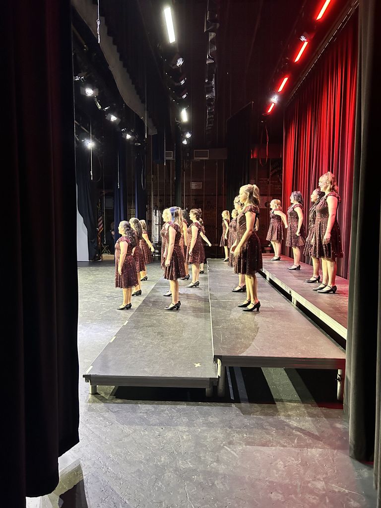 Spark! show choir on stage at a contest this spring.