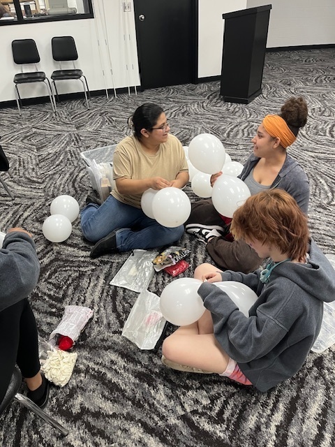 Choices students working on a service project for enrollment.