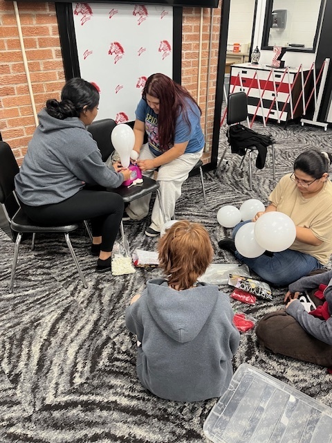 Choices students working on a service project for enrollment.