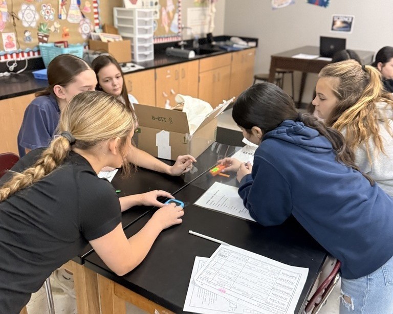 students in science class