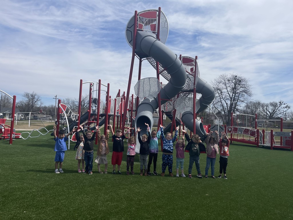 students playing on new playground