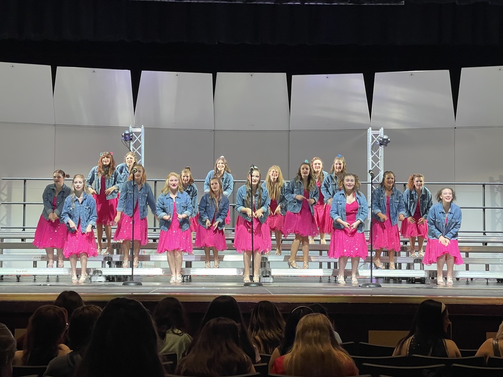 Sound Express in their jean jackets singing and dancing