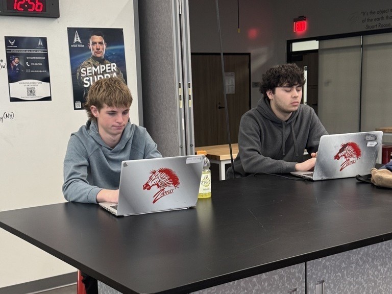 Claremore high school Aeronautics students working on drones.