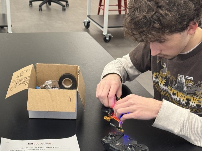 Claremore high school Aeronautics students working on drones.