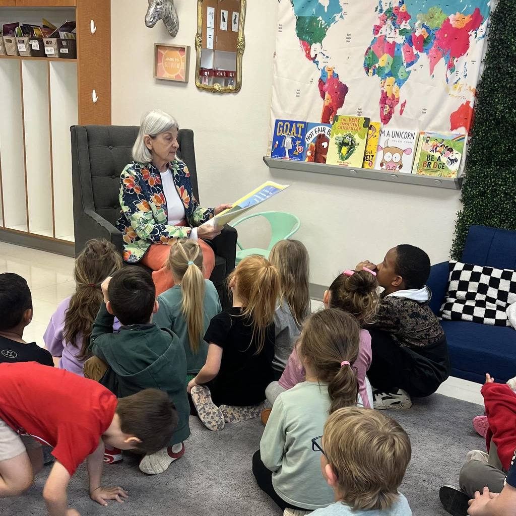 elementary students learning about gardening.