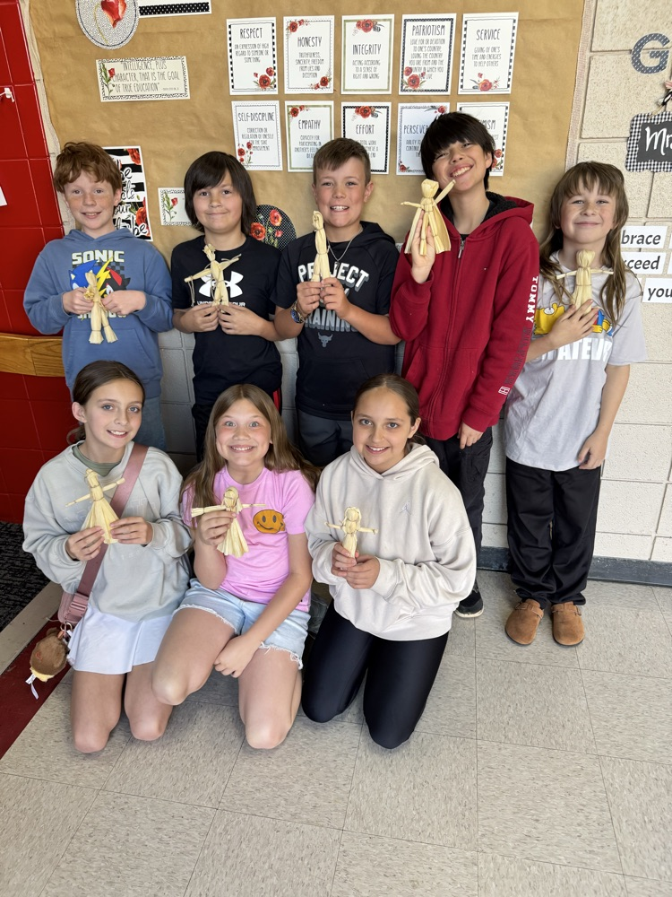 student making corn husks
