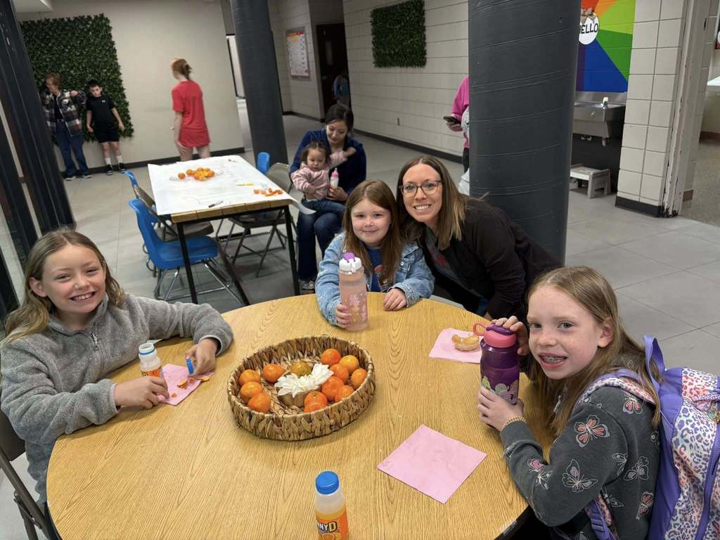 parents and children smiling