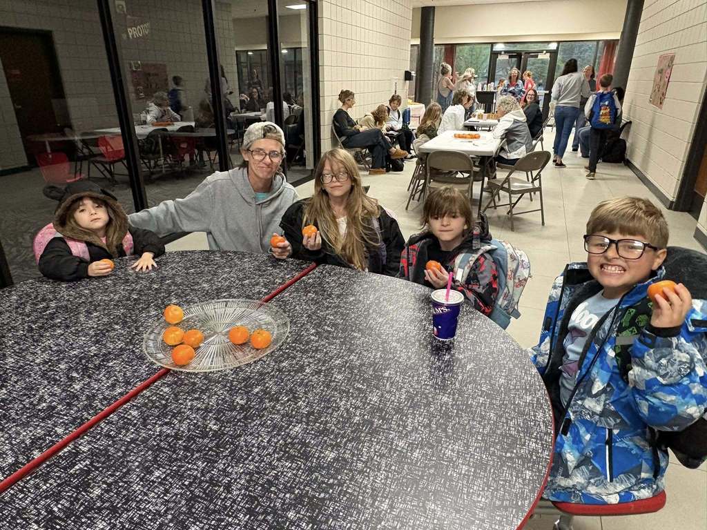 parents and children smiling