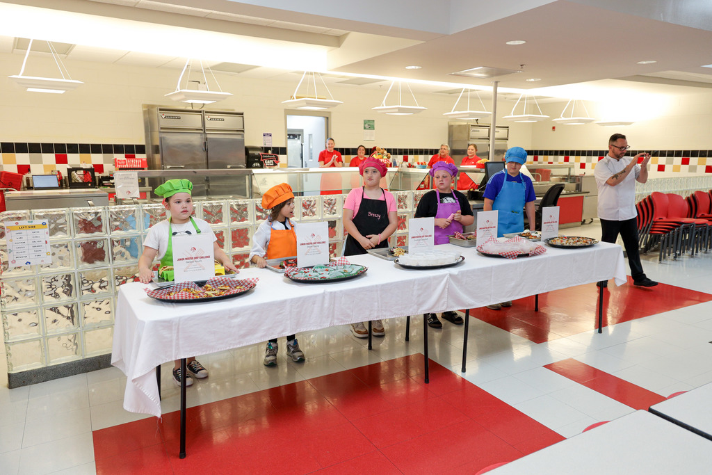 Junior Master Chef Contestants with their dishes. 