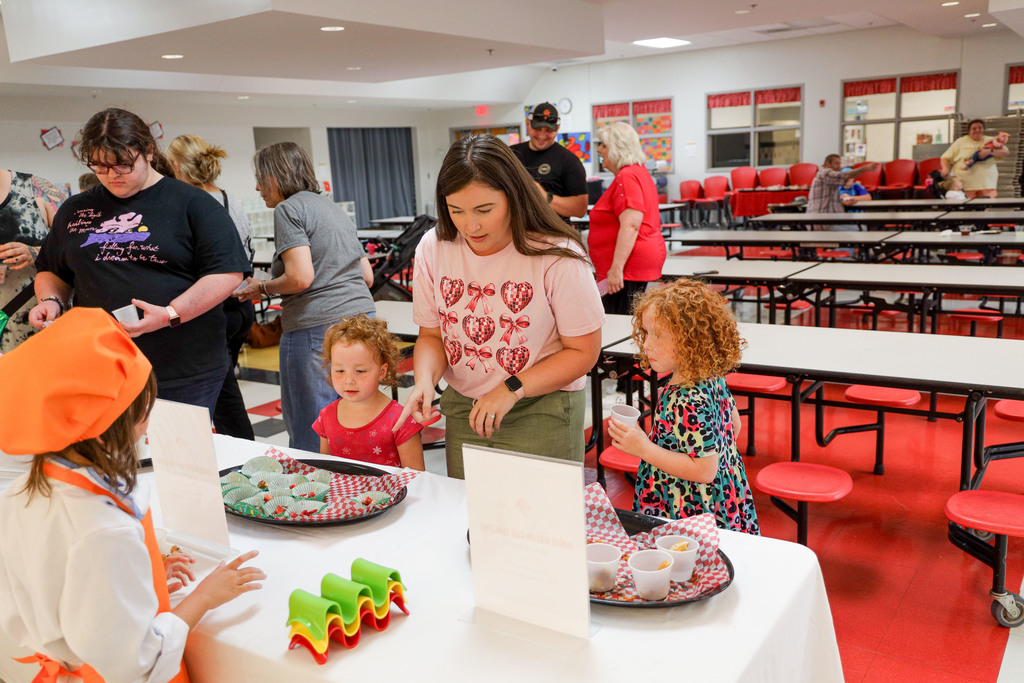 Parents supporting the Junior Master Chefs.
