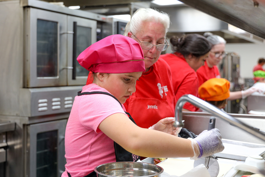 Junior Master Chef Contestants cooking.