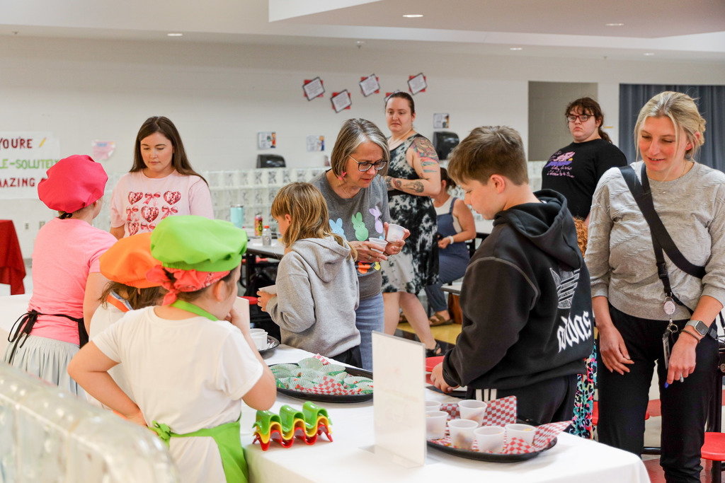 Parents supporting the Junior Master Chefs.