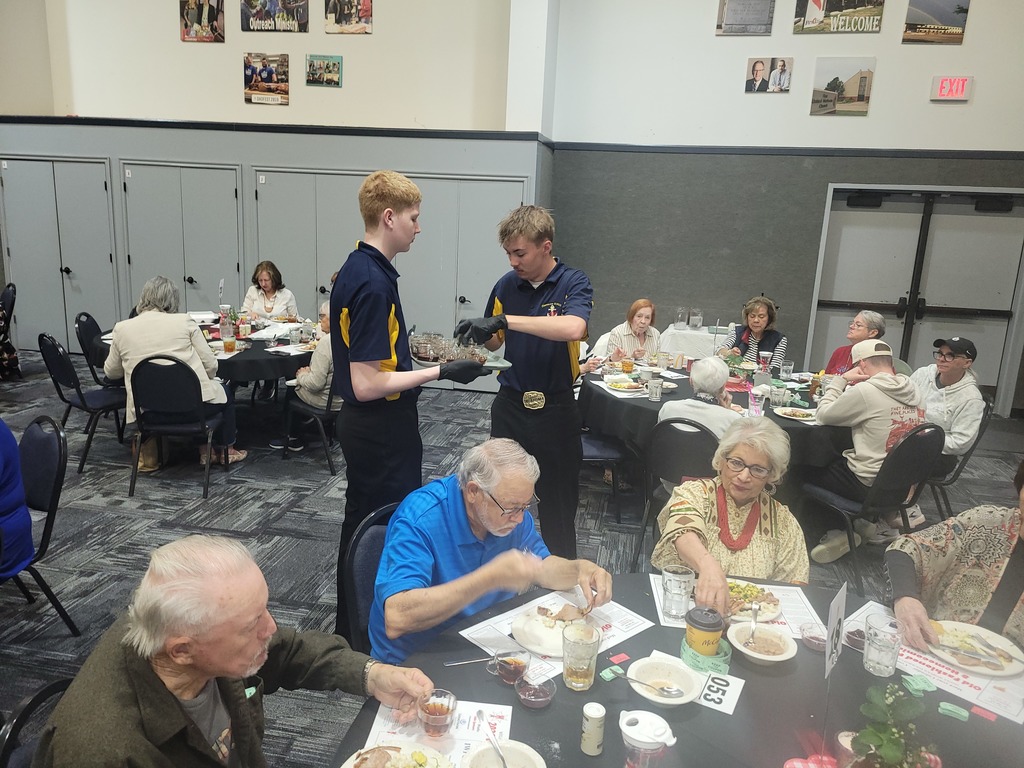 NJROTC students serving at Wild Onion Feast.