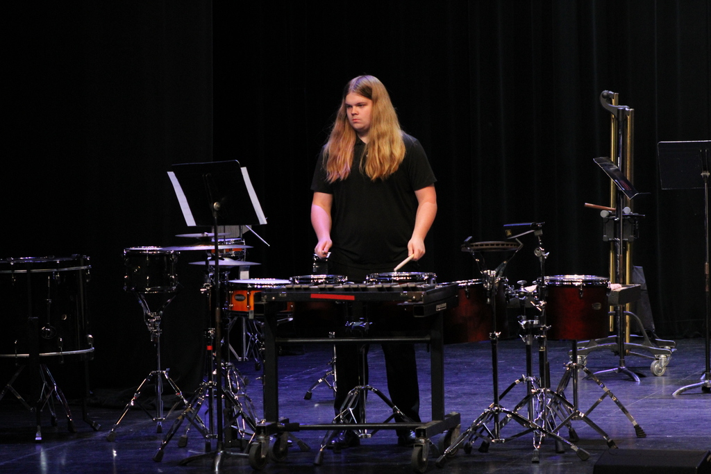 Senior student showcasing his solo on percussion 