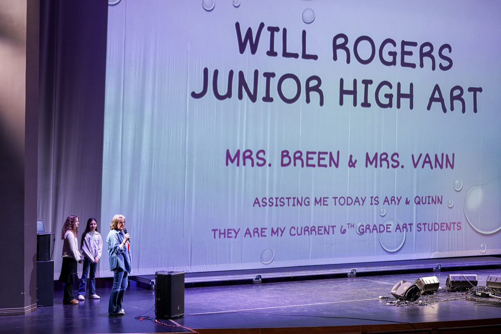 Junior high art teacher presenting