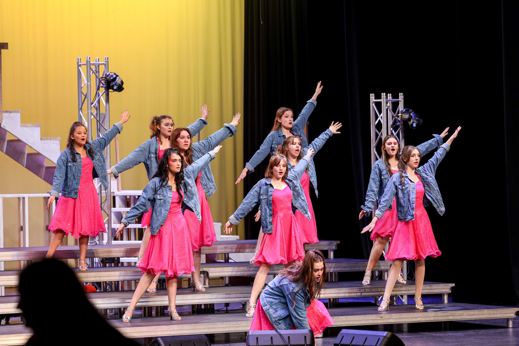 high school show choir express performing.