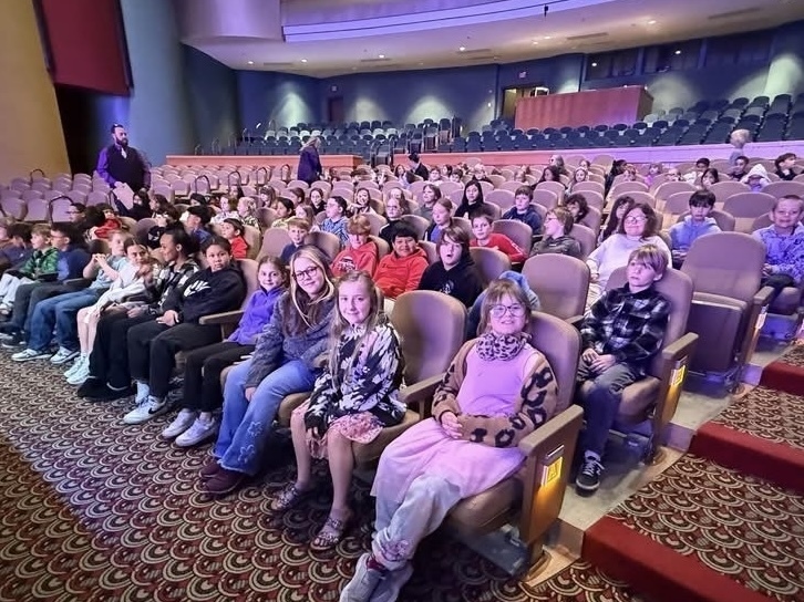 Claremont students smiling at the opera