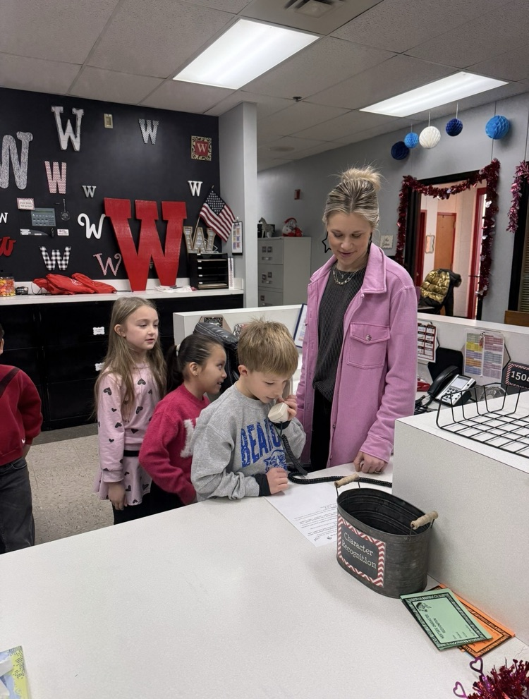 Ms Gelnar in office with students 