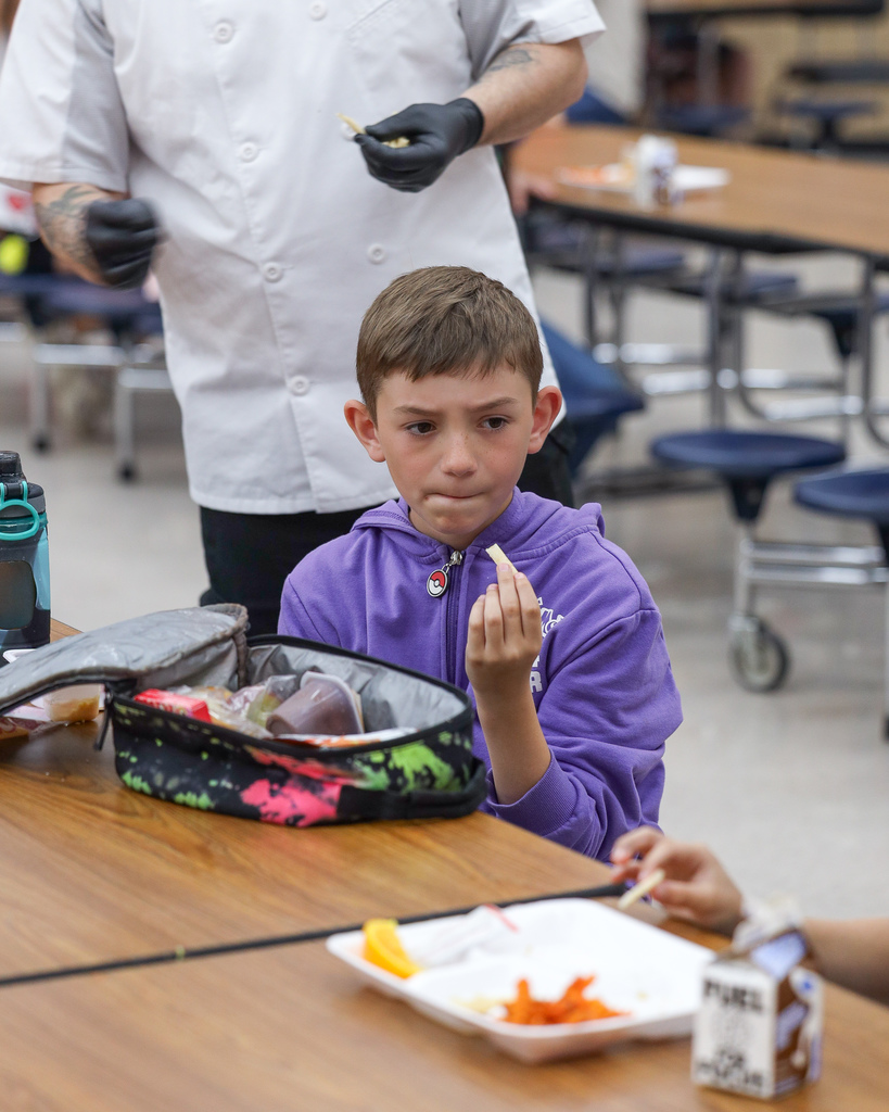 Elementary students trying Jicama