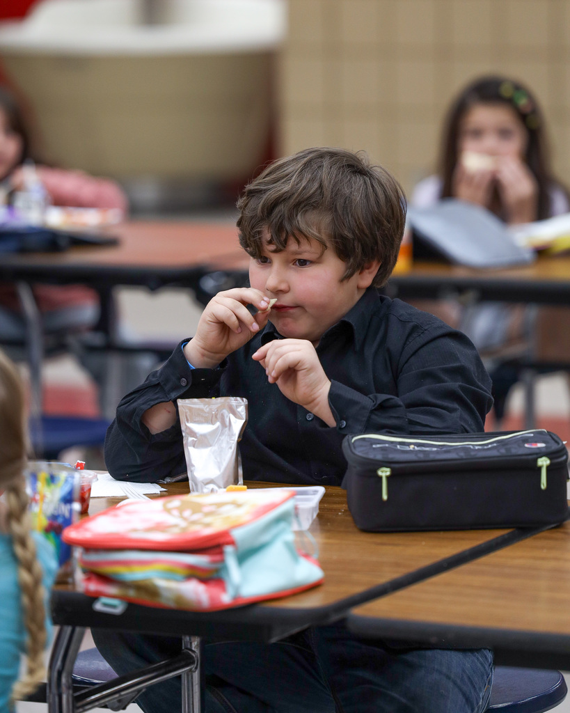 Elementary students trying Jicama