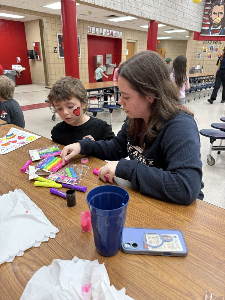 student getting their face painted