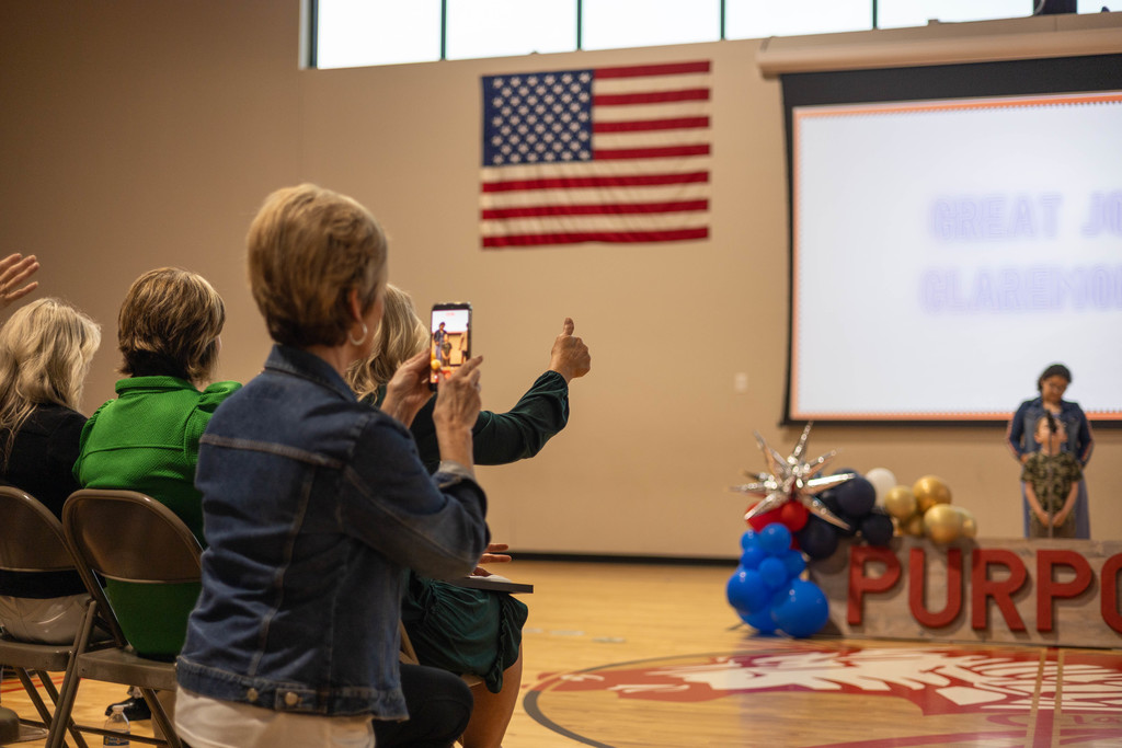 Student speaking at assembly