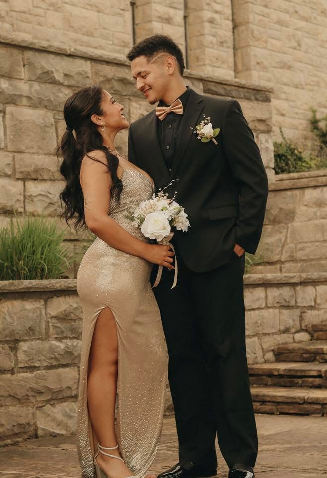 two students looking at each other for photos 