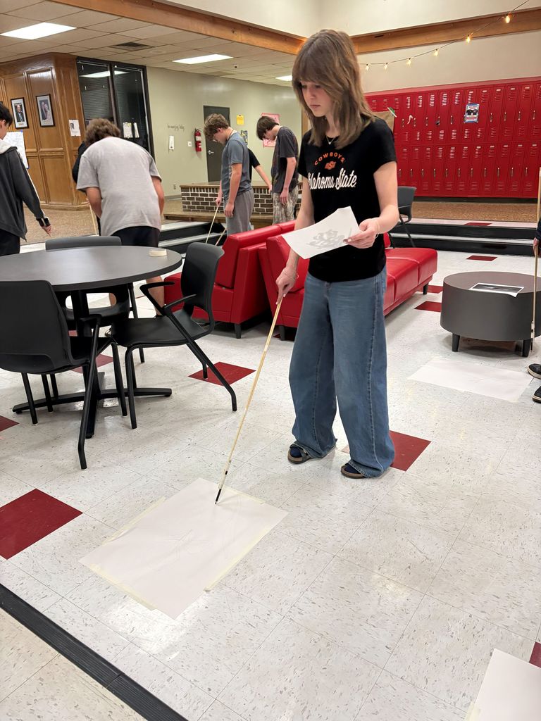 Student focused on making the most of her art challenge.