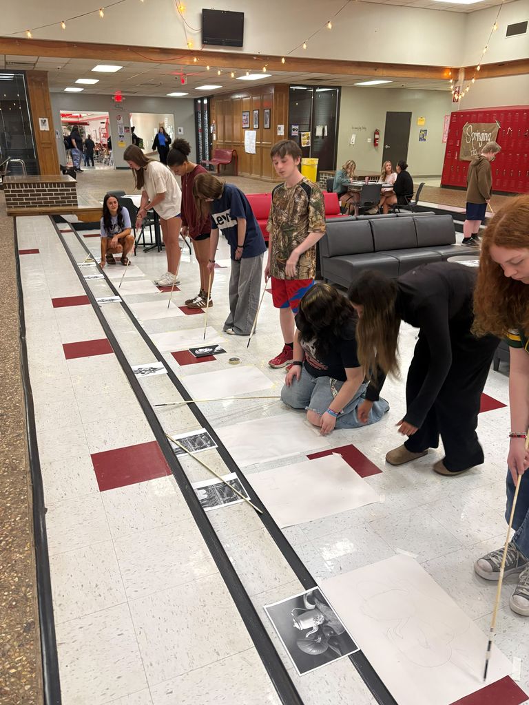 Art students in the pit at CHS working on their art challenge.