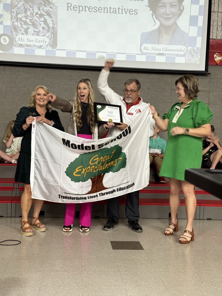 Westside accepts their award