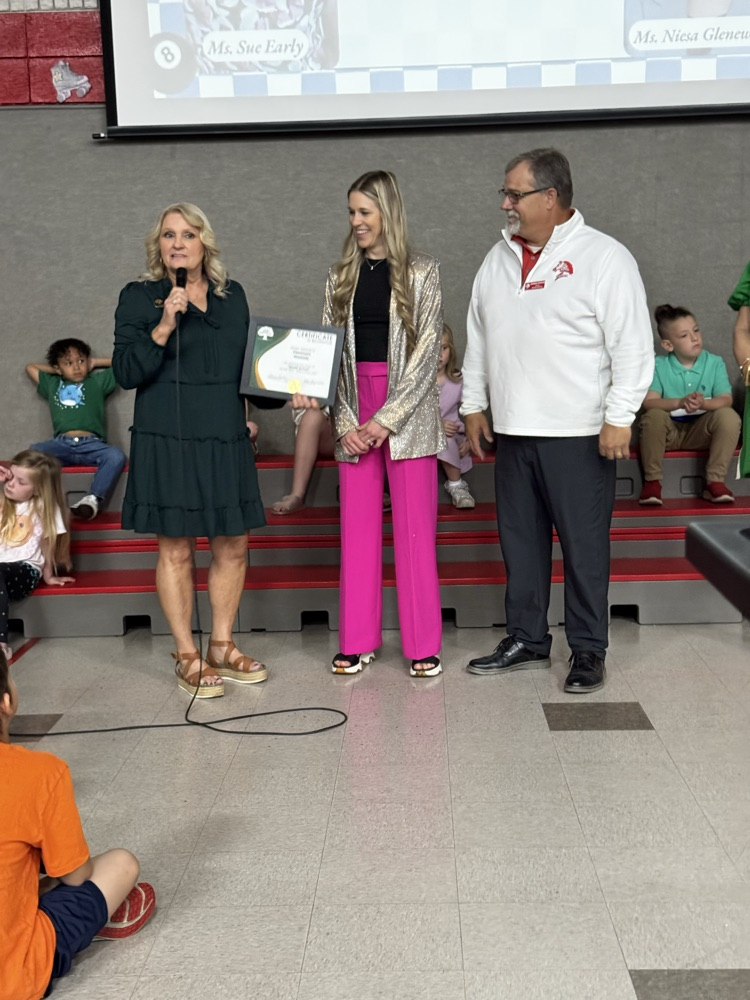 Westside posing and accepting award