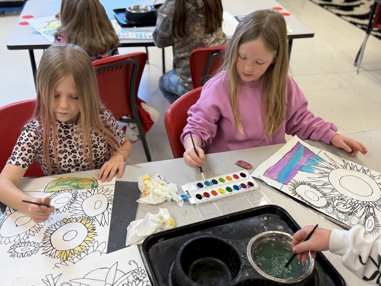 Students focused on their art project while working on their van Gogh projects.