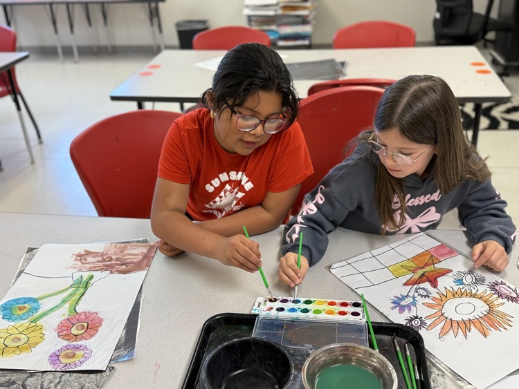 Students working on their art project at catalayah.
