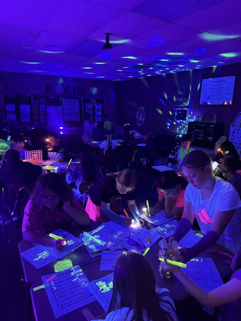 students participating in the glow party