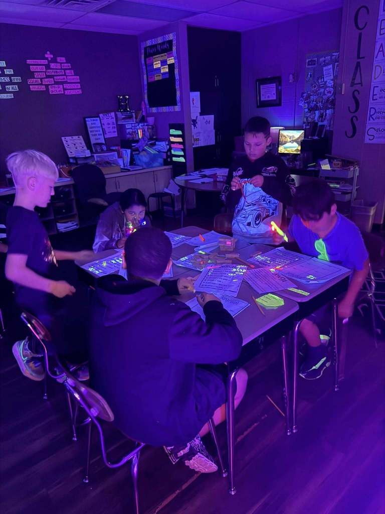 students participating in the glow party